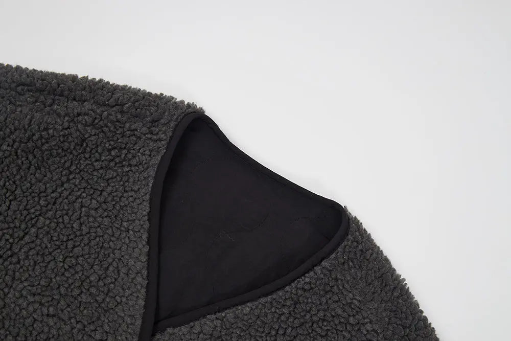 An image of a   41150 Quilted Jacket with Scarf by  Mirra Masa