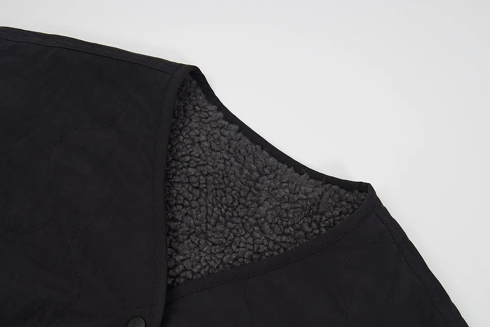 An image of a   41150 Quilted Jacket with Scarf by  Mirra Masa