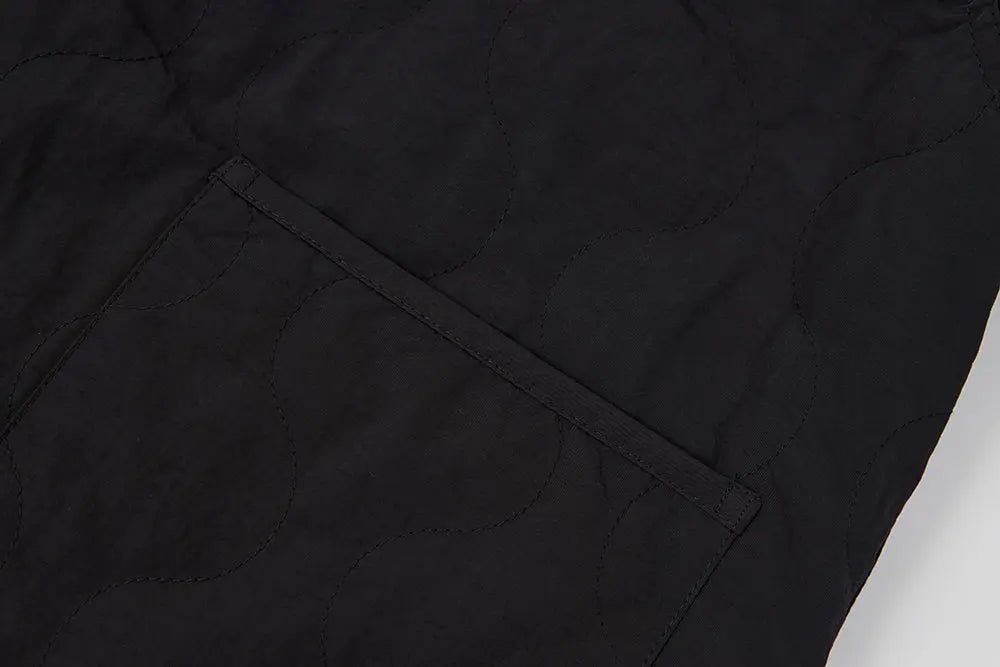 An image of a   41150 Quilted Jacket with Scarf by  Mirra Masa
