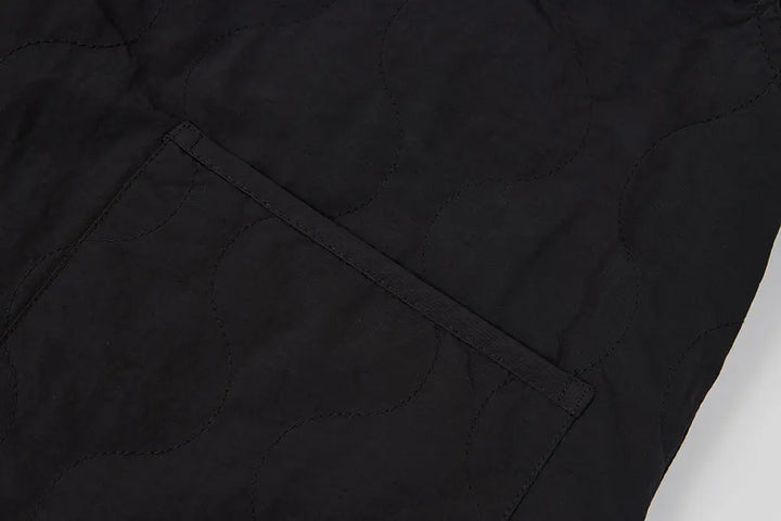 An image of a   41150 Quilted Jacket with Scarf by  Mirra Masa