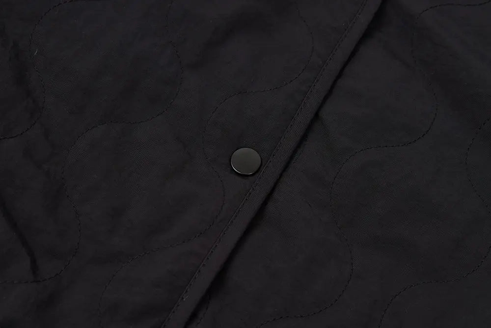 An image of a   41150 Quilted Jacket with Scarf by  Mirra Masa