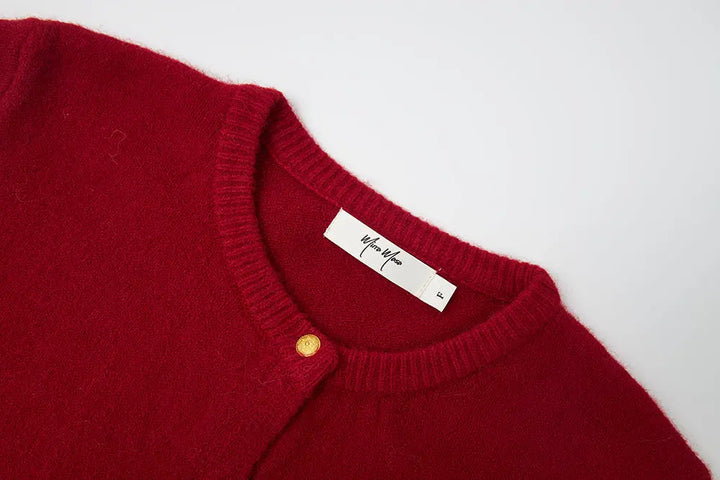 An image of a   41245 Crewneck Cardigan by  Mirra Masa