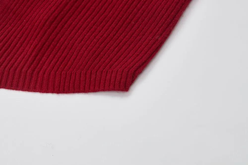 An image of a   41621 Soft Line Ribbed Wool Top by  Mirra Masa