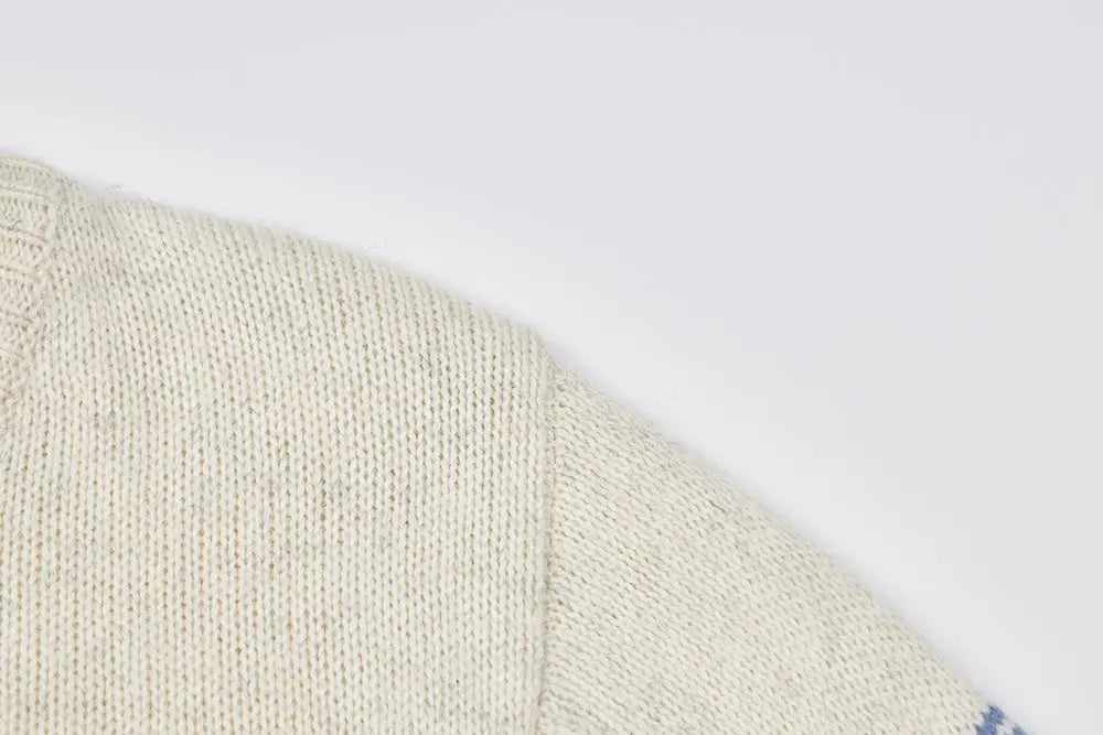 An image of a   41622 Striped Crewneck Cardigan by  Mirra Masa