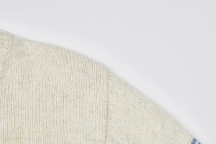 An image of a   41622 Striped Crewneck Cardigan by  Mirra Masa