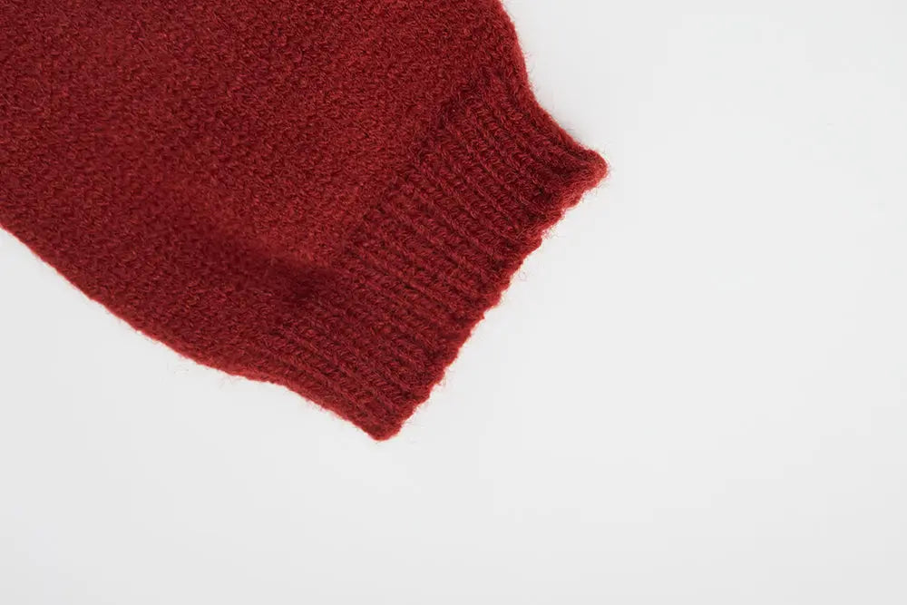 An image of a   41640 Round Neck Knit with Pearls & Bow by  Mirra Masa