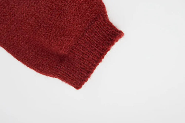 An image of a   41640 Round Neck Knit with Pearls & Bow by  Mirra Masa