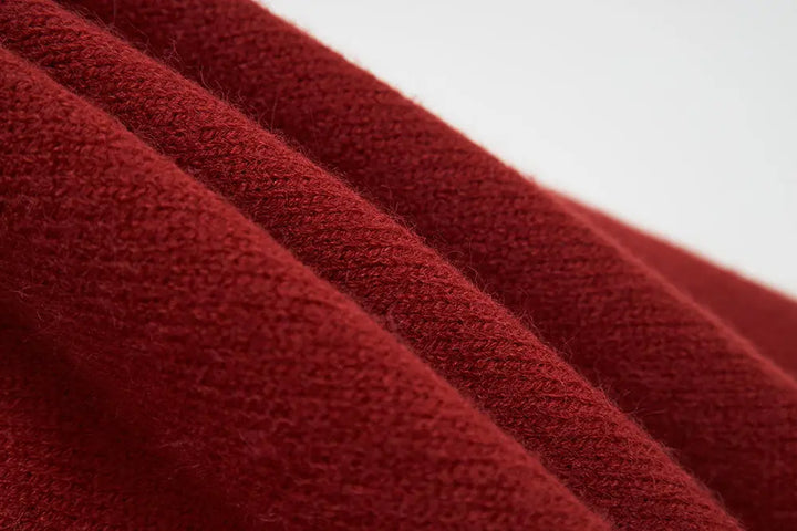 An image of a   41640 Round Neck Knit with Pearls & Bow by  Mirra Masa