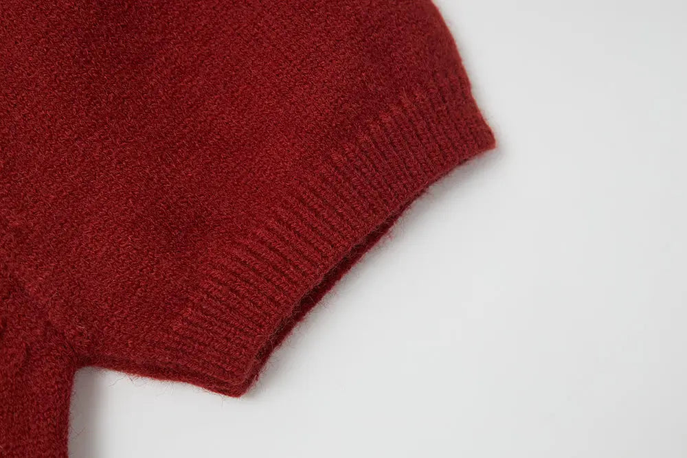 An image of a   41640 Round Neck Knit with Pearls & Bow by  Mirra Masa