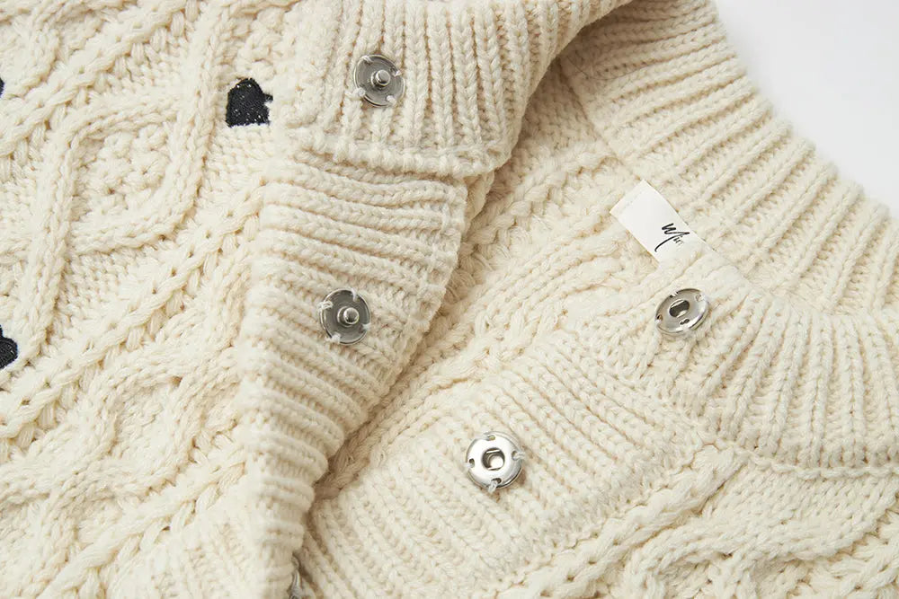 An image of a   41686 Hearty Trim Cable Knit Sweater by  Mirra Masa