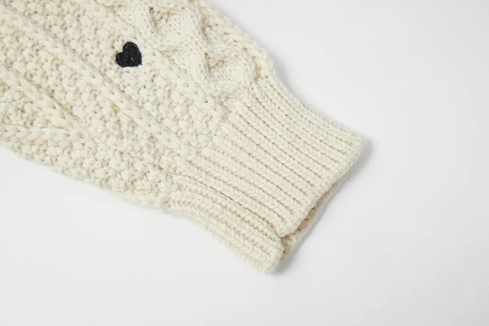 An image of a   41686 Hearty Trim Cable Knit Sweater by  Mirra Masa