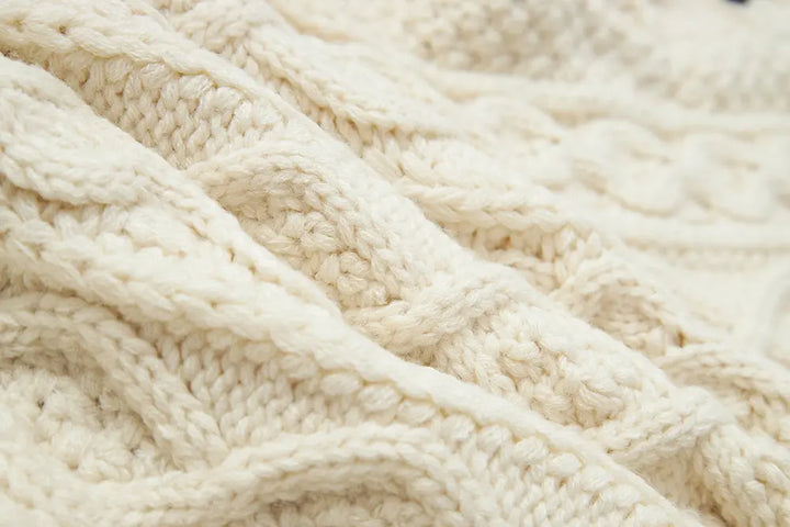 An image of a   41686 Hearty Trim Cable Knit Sweater by  Mirra Masa