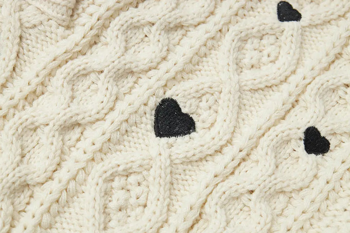 An image of a   41686 Hearty Trim Cable Knit Sweater by  Mirra Masa