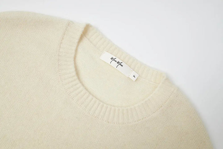 An image of a   41836 Crewneck Wool Sweater with Bow by  Mirra Masa