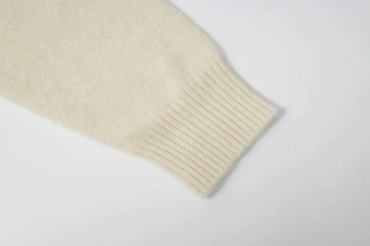 An image of a   41836 Crewneck Wool Sweater with Bow by  Mirra Masa