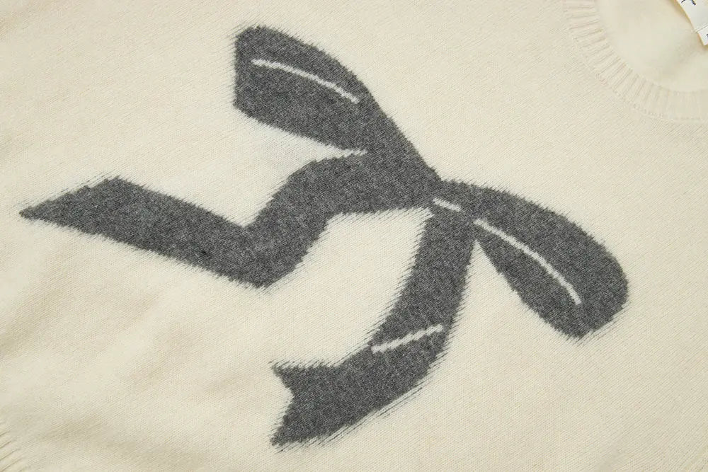 An image of a   41836 Crewneck Wool Sweater with Bow by  Mirra Masa