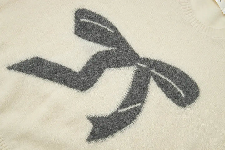 An image of a   41836 Crewneck Wool Sweater with Bow by  Mirra Masa