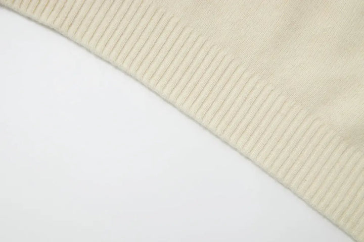 An image of a   41836 Crewneck Wool Sweater with Bow by  Mirra Masa