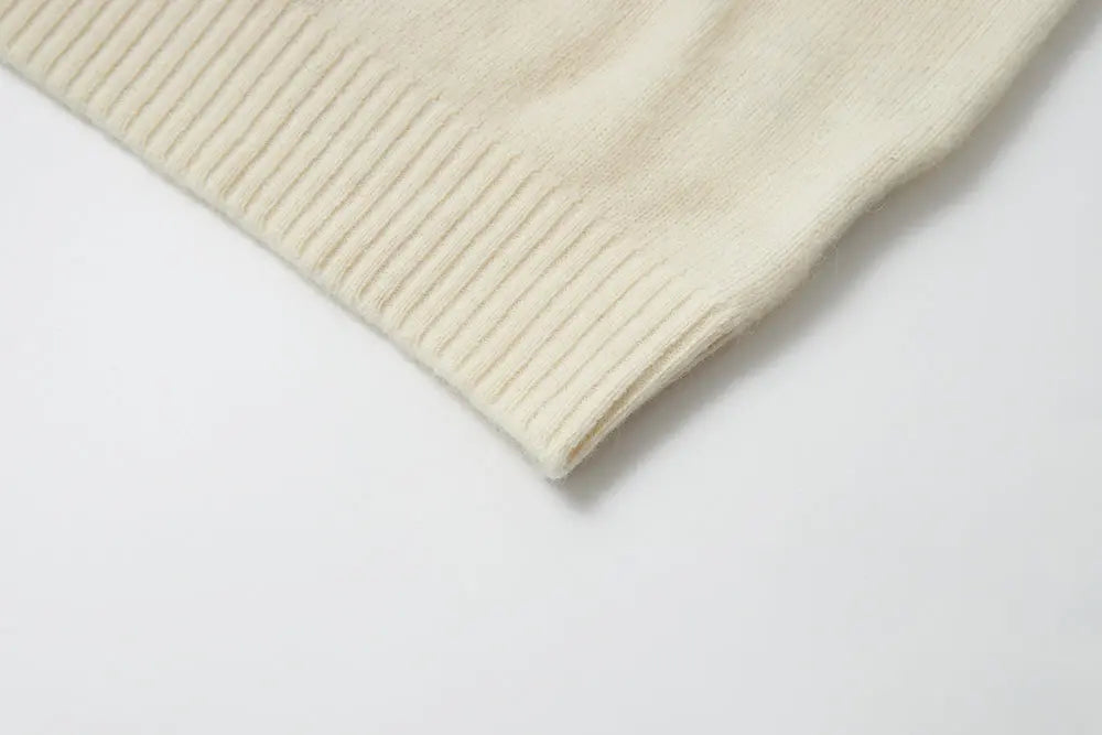 An image of a   41836 Crewneck Wool Sweater with Bow by  Mirra Masa