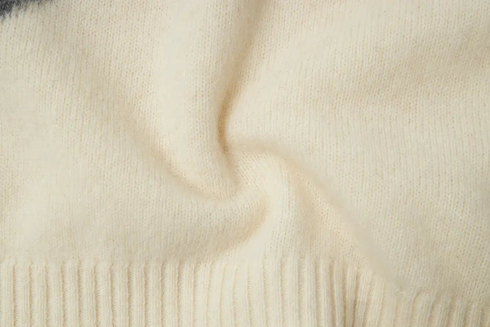 An image of a   41836 Crewneck Wool Sweater with Bow by  Mirra Masa