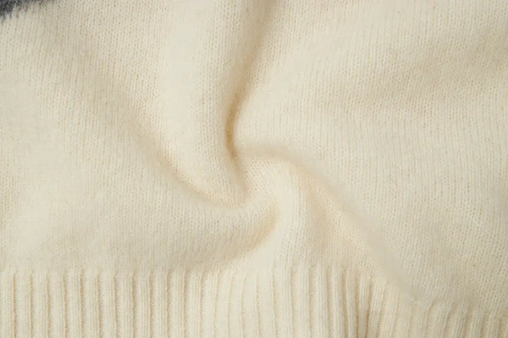 An image of a   41836 Crewneck Wool Sweater with Bow by  Mirra Masa