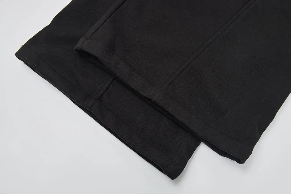 An image of a   42274 Extra Warmth Flare Pants by  Mirra Masa