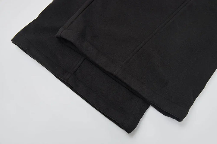 An image of a   42274 Extra Warmth Flare Pants by  Mirra Masa