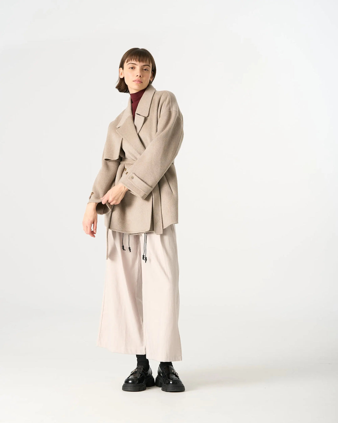 An image of a   44150 Short Wool Coat by  Mirra Masa