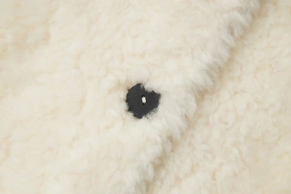 An image of a   44389 Women's Cropped Wool Teddy Jacket by  Mirra Masa