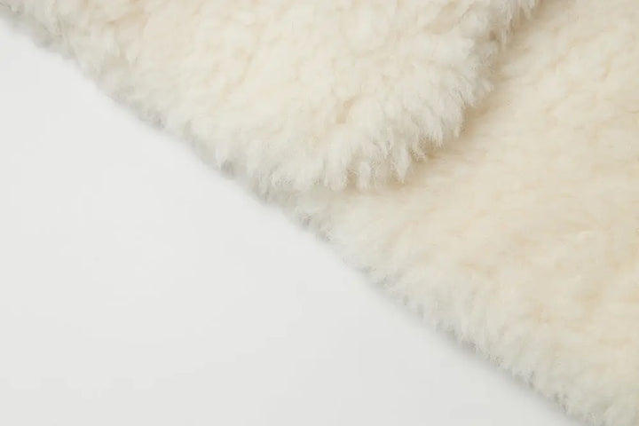 An image of a   44389 Women's Cropped Wool Teddy Jacket by  Mirra Masa