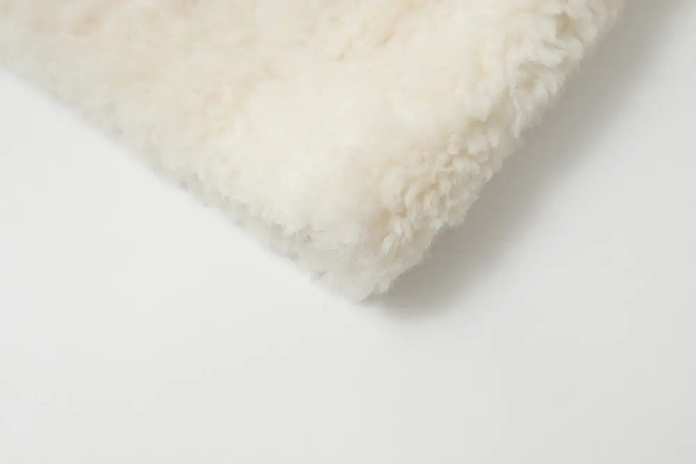 An image of a   44389 Women's Cropped Wool Teddy Jacket by  Mirra Masa