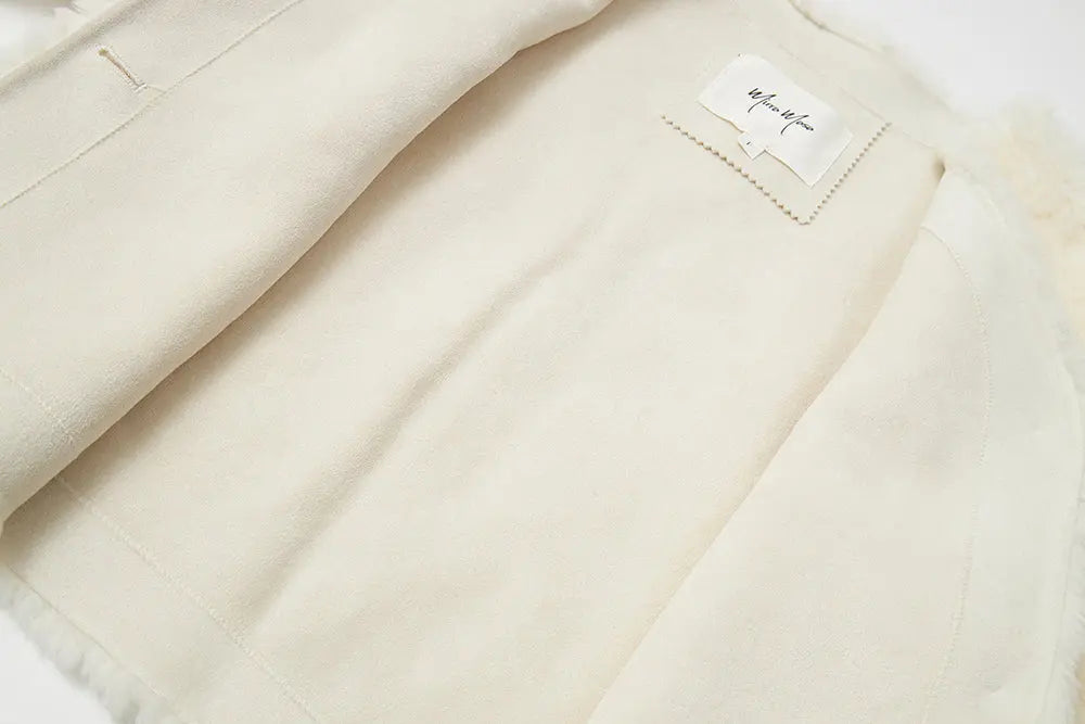 An image of a   44389 Women's Cropped Wool Teddy Jacket by  Mirra Masa