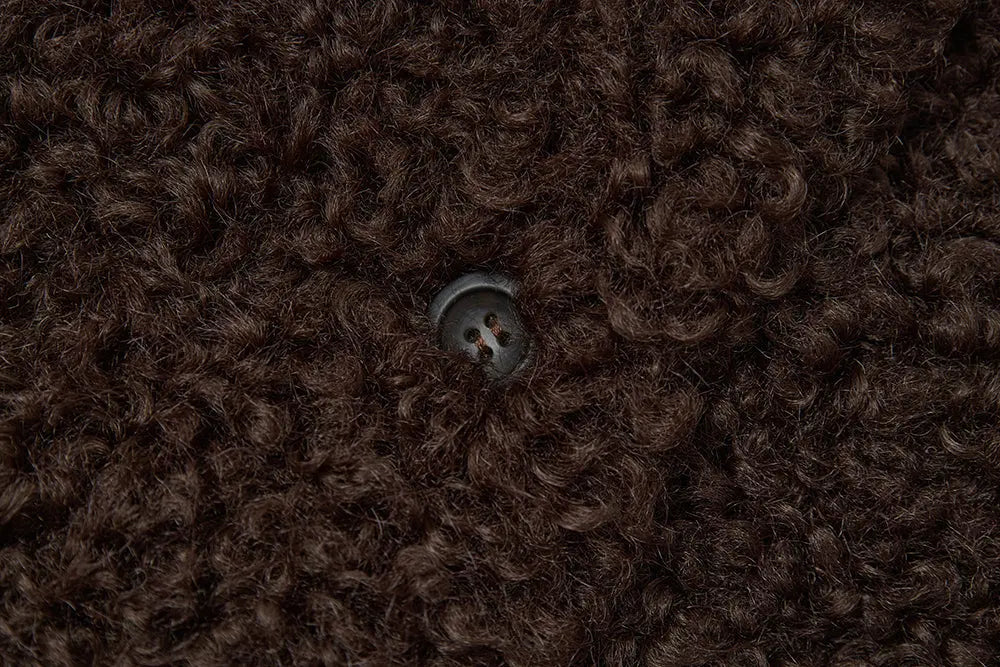 An image of a   44584 Women's Cropped Sherpa Jacket by  Mirra Masa