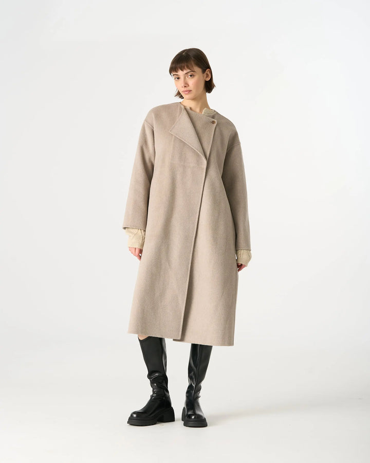 An image of a   44654 Wool Coat with Double Lapel by  Mirra Masa