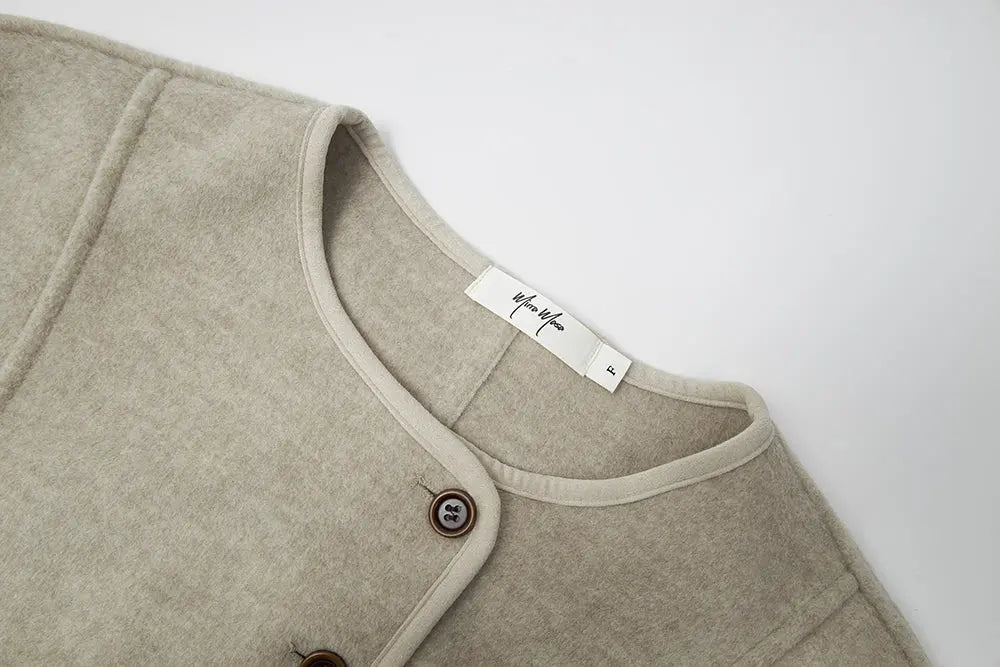 An image of a   44782 Plaid-Cuff Jacket by  Mirra Masa