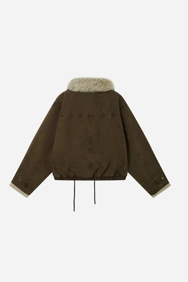 An image of a   44980 Shearling Button Down Jacket by  Mirra Masa