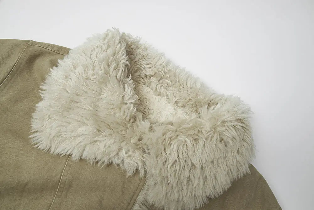 An image of a   44980 Shearling Button Down Jacket by  Mirra Masa
