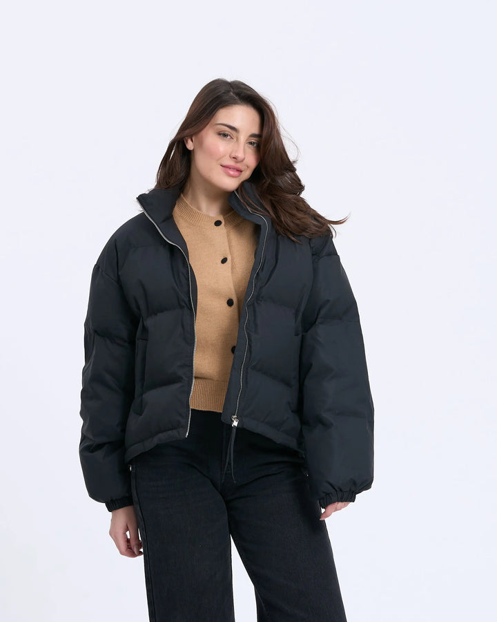 An image of a  Black-Small 8712 M'Puffer by  Mirra Masa