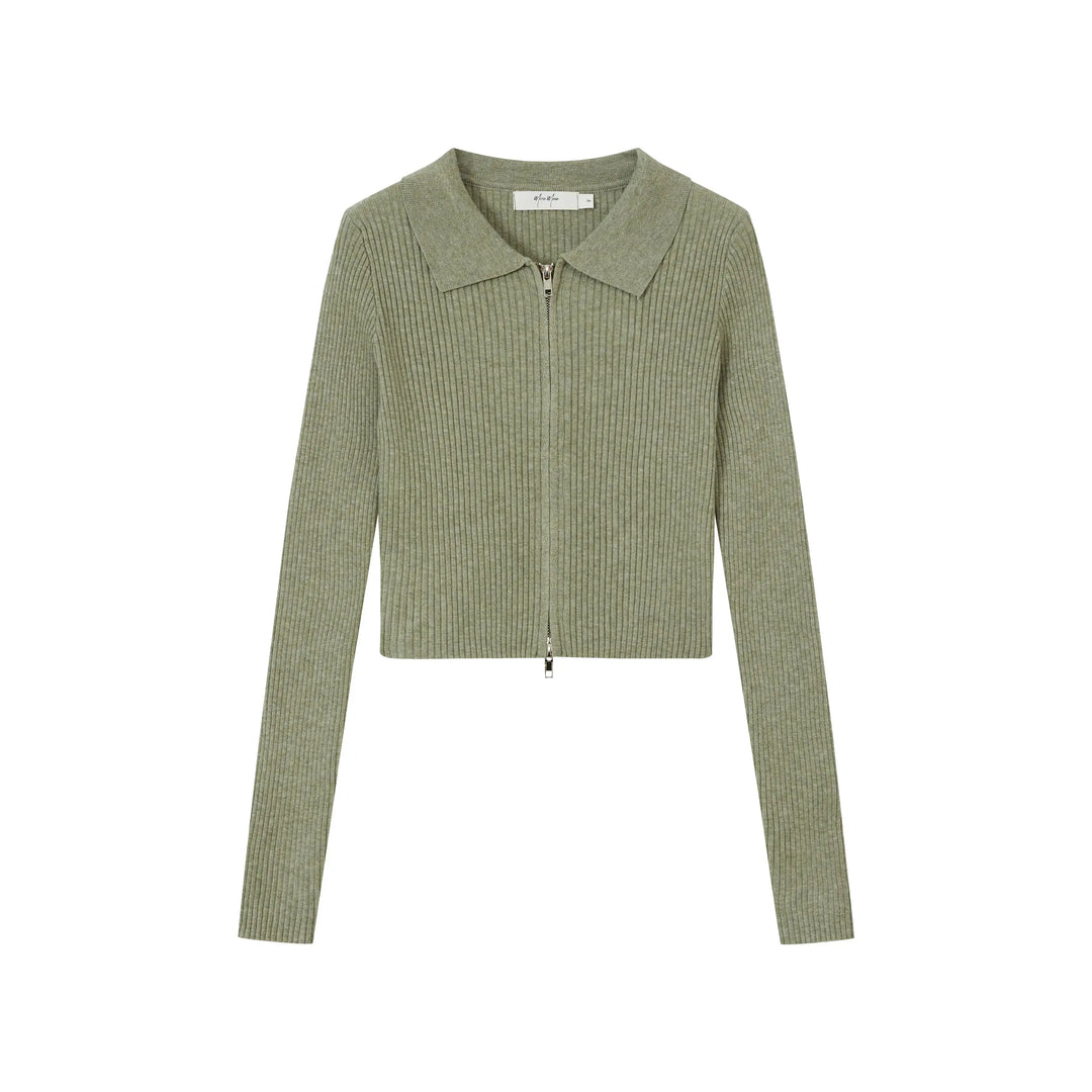 An image of a   9976 Zip-Up Knit Top by  Mirra Masa