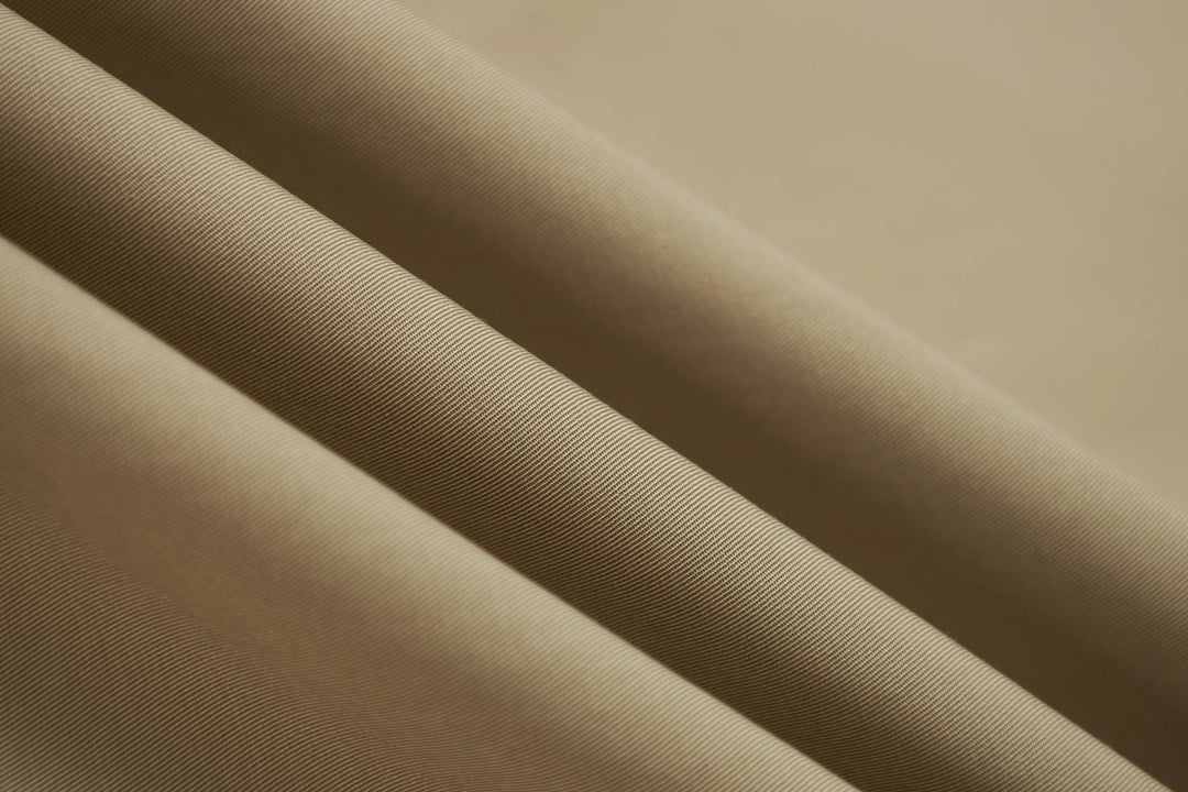 An image of a   A072 Short Trench Coat by  Mirra Masa