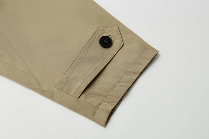 An image of a   A072 Short Trench Coat by  Mirra Masa