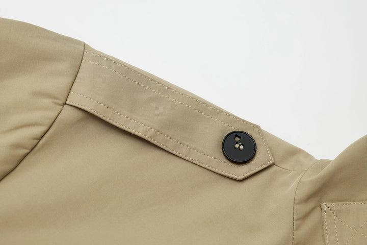 An image of a   A072 Short Trench Coat by  Mirra Masa