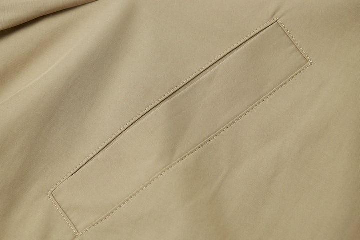 An image of a   A072 Short Trench Coat by  Mirra Masa