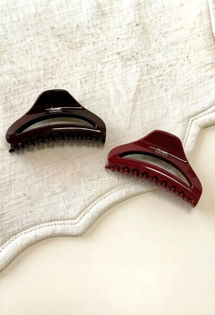 An image of a   Arched Cutout Hair Claw Large by  Mirra Masa