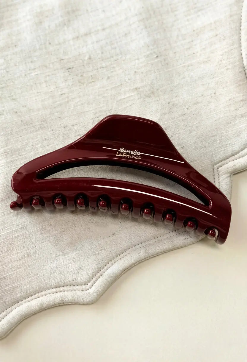 An image of a   Arched Cutout Hair Claw Large by  Mirra Masa