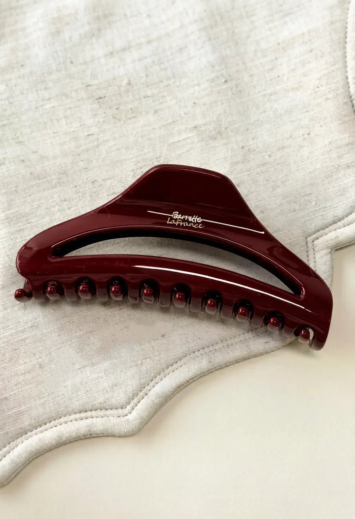 An image of a   Arched Cutout Hair Claw Large by  Mirra Masa