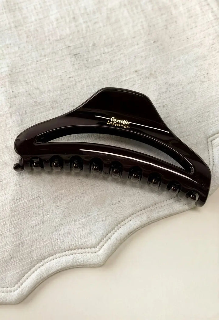 An image of a   Arched Cutout Hair Claw Large by  Mirra Masa