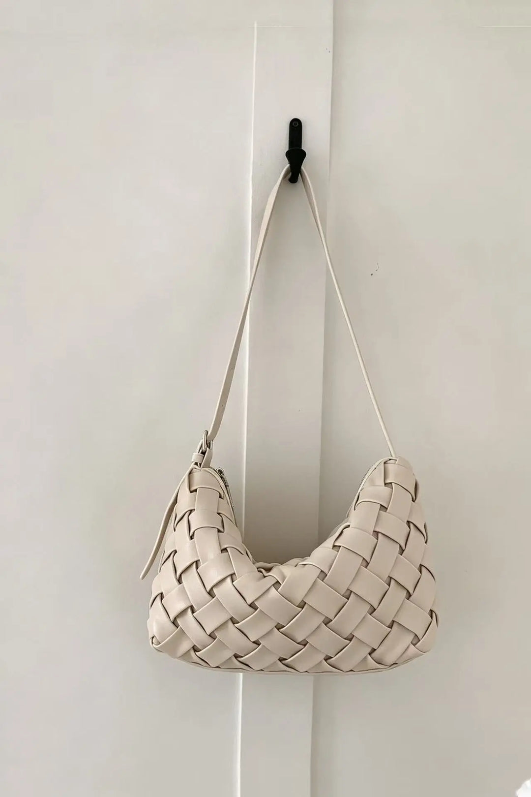 An image of a   B16880 Woven Shoulder Bag by  Mirra Masa