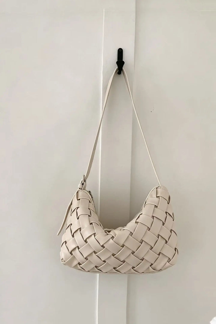 An image of a   B16880 Woven Shoulder Bag by  Mirra Masa