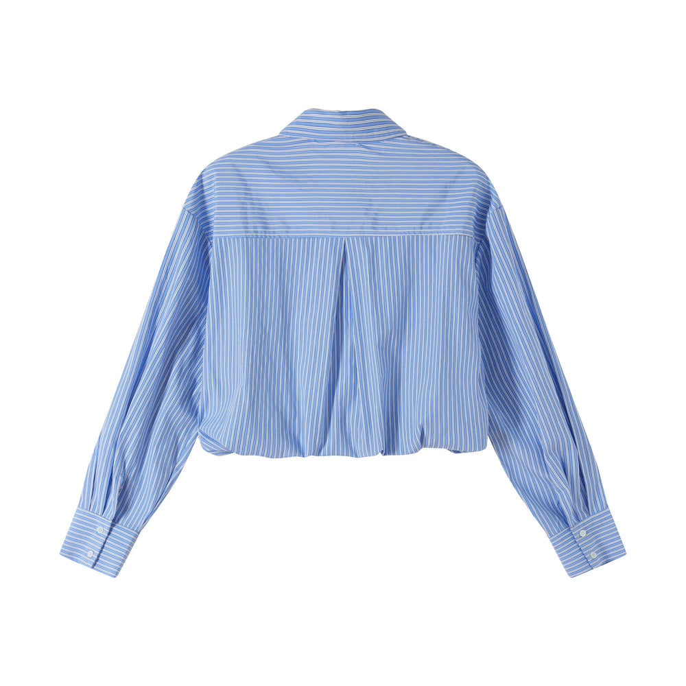 An image of a   BL5Z0M6 Cropped and Tucked Shirt by  Mirra Masa